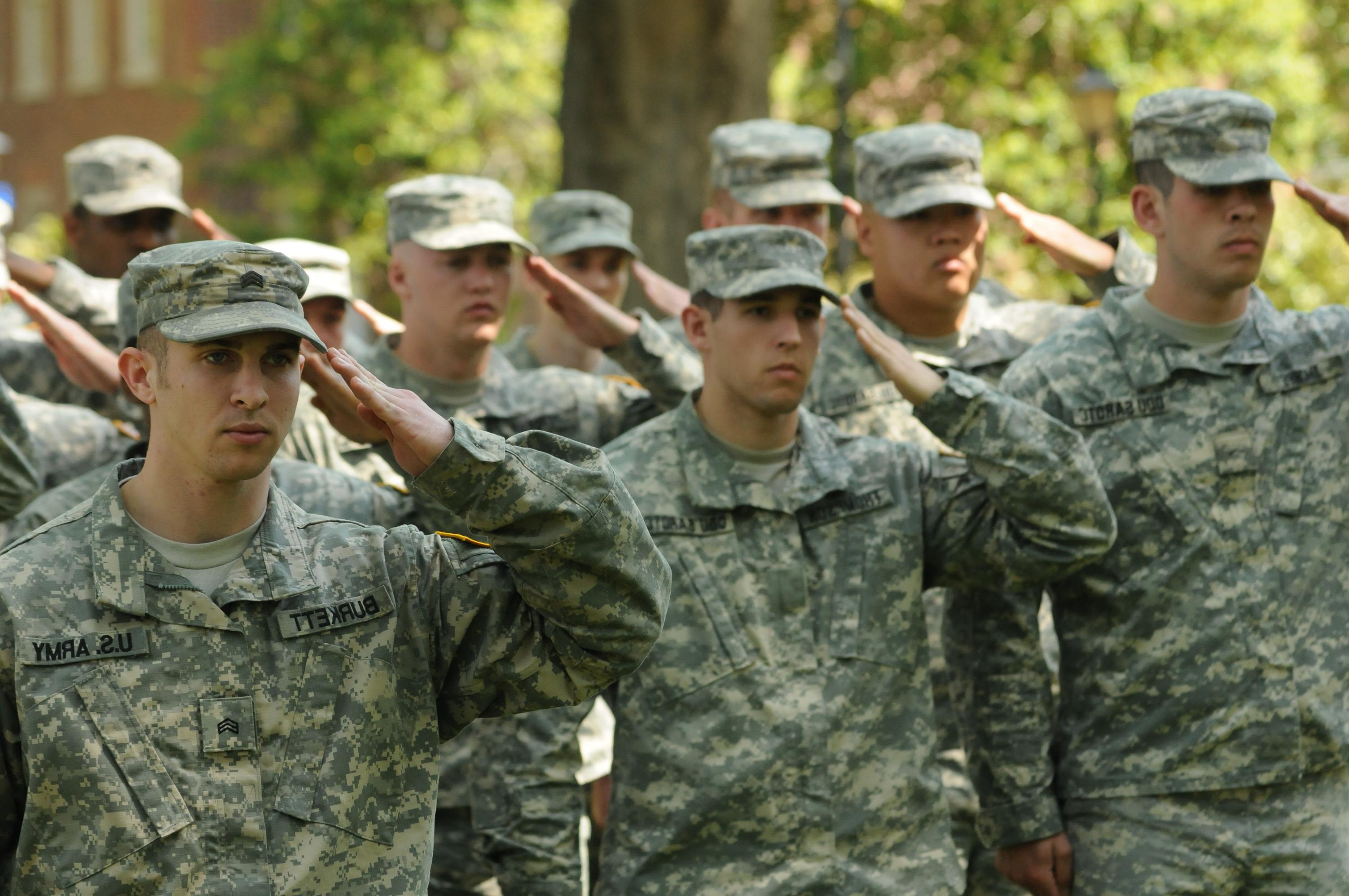 men in uniform saluting